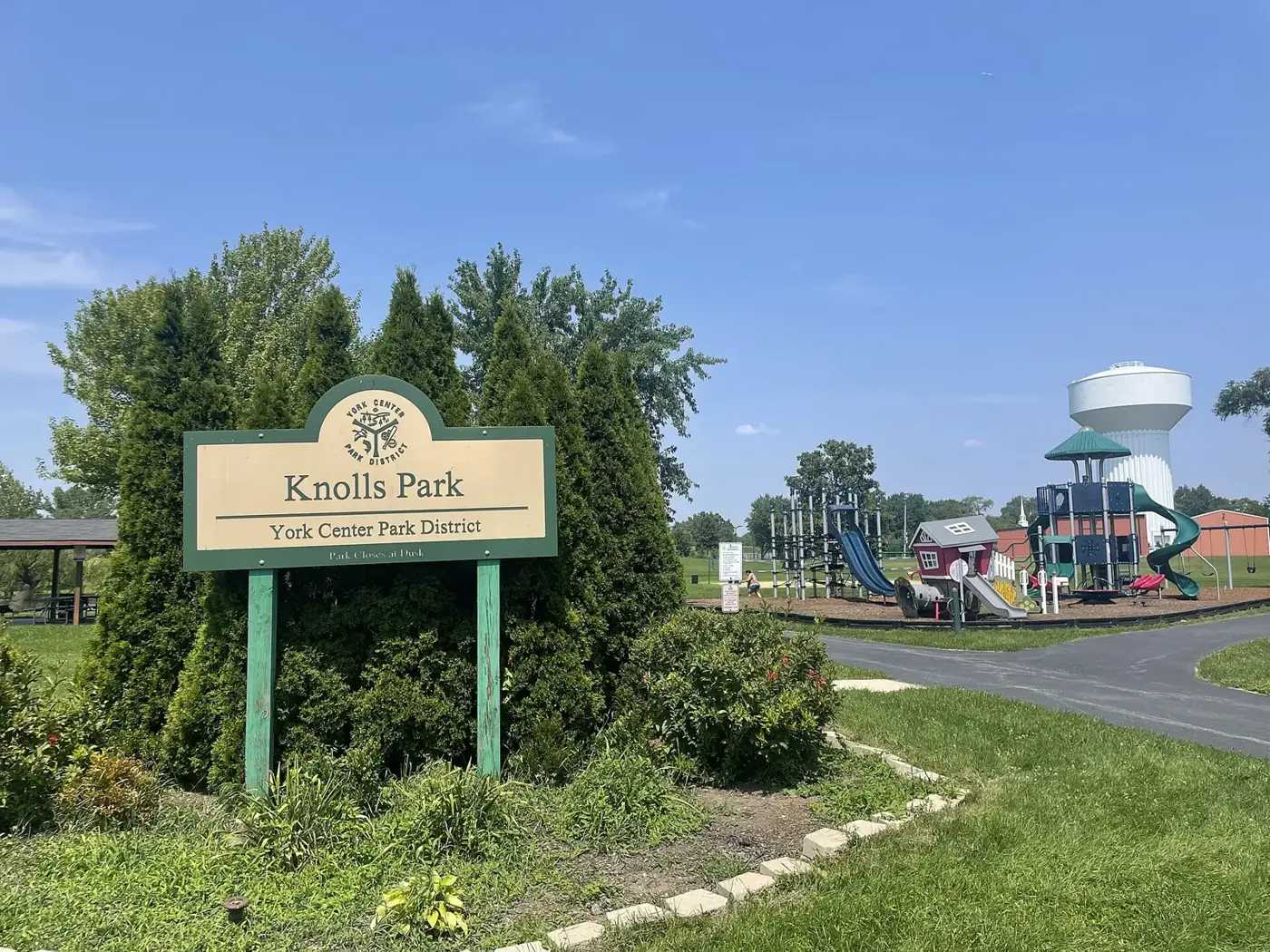Open lawn and trees at Knolls Park in Lombard