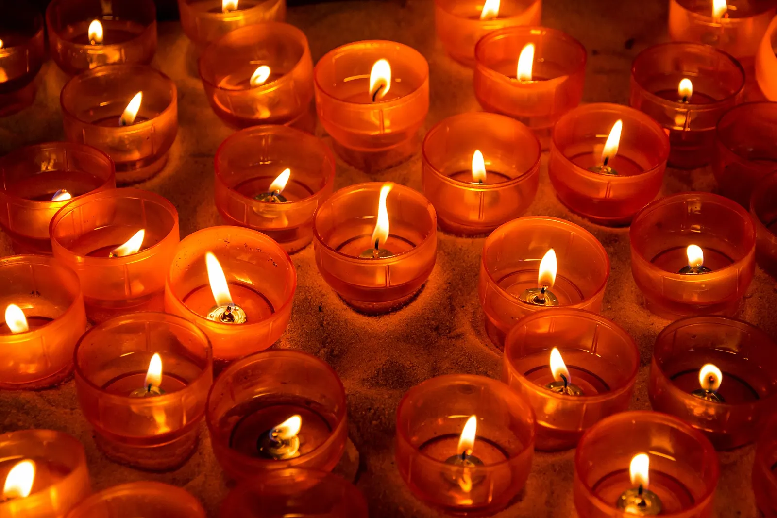 Votive candles in a chapel
